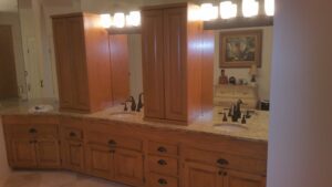 Beige bathroom with nice cabinets